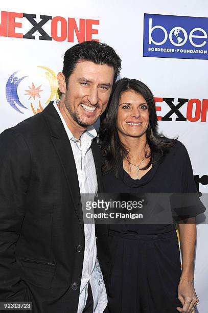 Baseball player Nomar Garciaparra and Womens Soccer player Mia Hamm attend the ONEXONE Gala on October 22, 2009 in San Francisco, California.