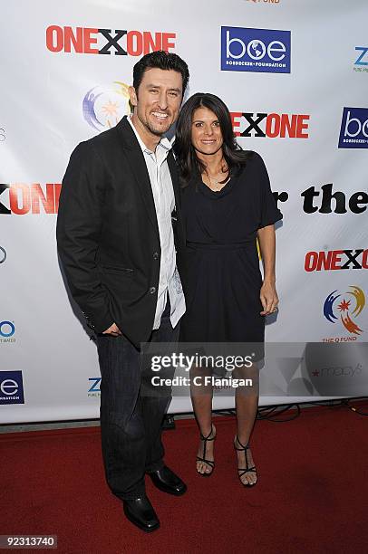 Baseball player Nomar Garciaparra and Womens Soccer player Mia Hamm attend the ONEXONE Gala on October 22, 2009 in San Francisco, California.