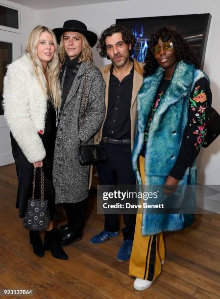 Gracie Egan, Annabelle Simpson, Derrik Santini and Jenny Bastet attend a private view of artist Derrick Santini's new exhibition 'Float & Fly' at The...