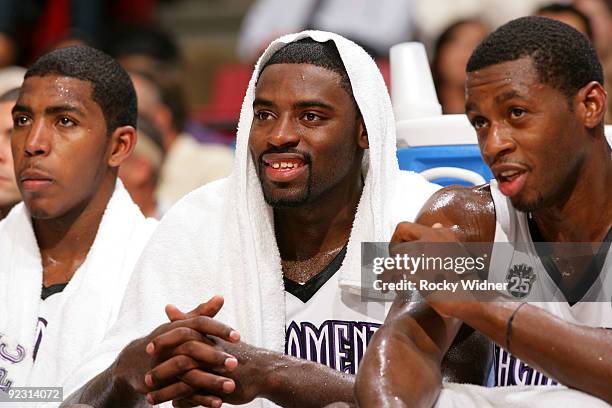 Tyreke Evans and Desmond Mason of the Sacramento Kings watch as their teammates take on the Utah Jazz during a preseason game on October 23, 2009 at...