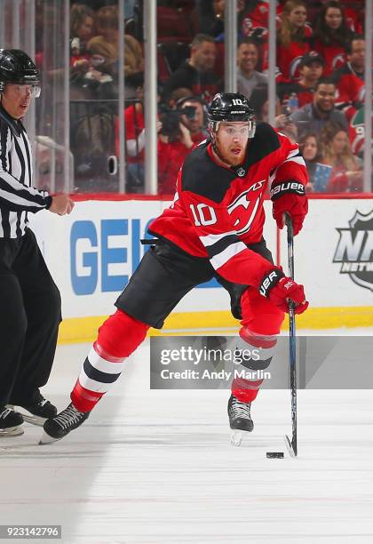 Jimmy Hayes of the New Jersey Devils plays the puck against the Columbus Blue Jackets during the game at Prudential Center on February 20, 2018 in...