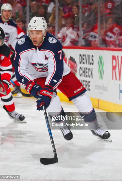 Jack Johnson of the Columbus Blue Jackets plays the puck during the game against the New Jersey Devils at Prudential Center on February 20, 2018 in...