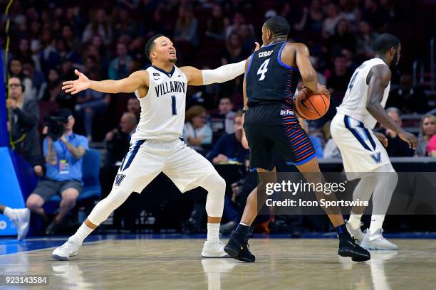 Villanova Wildcats guard Jalen Brunson defends against DePaul Blue Demons guard Brandon Cyrus during the basketball game between the DePaul Blue...