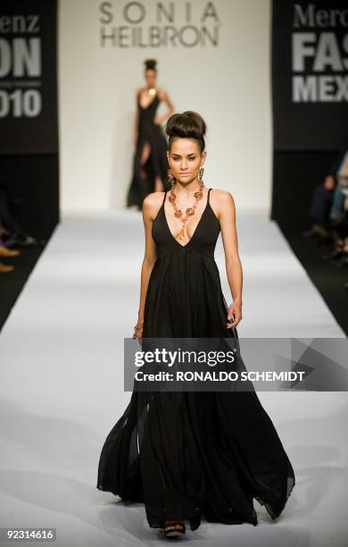 Model displays a creation by Colombian designer Sonia Heilbron during the Mercedes Benz Fashion Week in Mexico City on October 23, 2009. AFP...