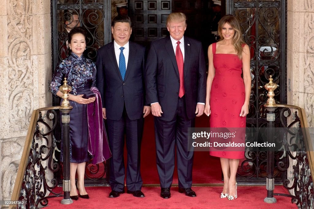 Donald Trump and First Lady Melania Trump pose for a photo with Chinese President Xi Jingping and his wife