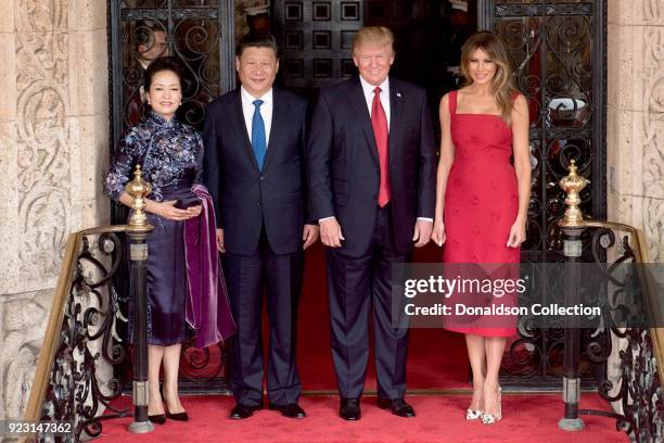President Donald Trump and First Lady Melania Trump pose for a photo with Chinese President Xi Jingping and his wife, Mrs. Peng Liyuan, Thursday,...