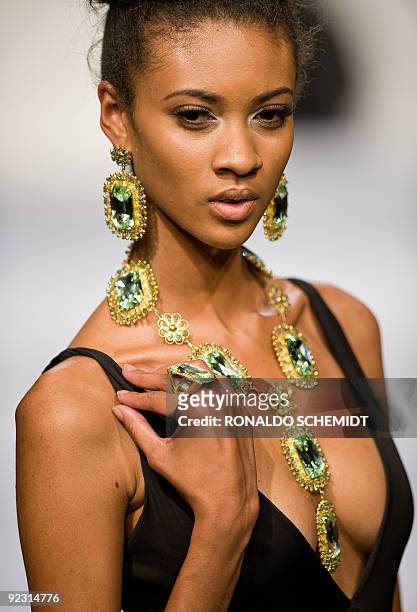 Model displays a creation by Colombian designer Sonia Heilbron during the Mercedes Benz Fashion Week in Mexico City on October 23, 2009. AFP...