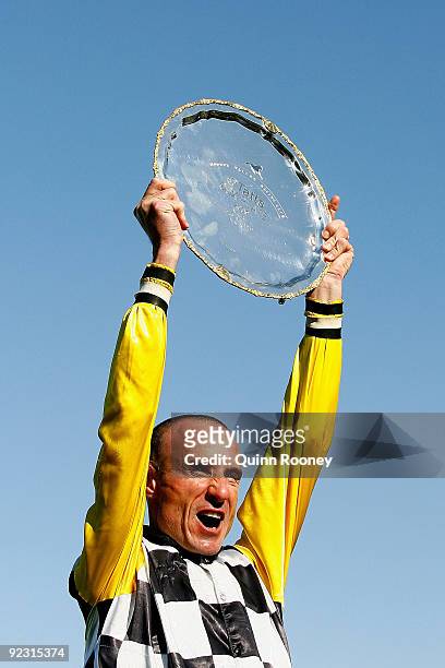 Glen Boss celebrates with the Cox Plate after riding So You Think to victory in the Tatts Cox Plate during the 2009 Cox Plate Day meeting at Moonee...