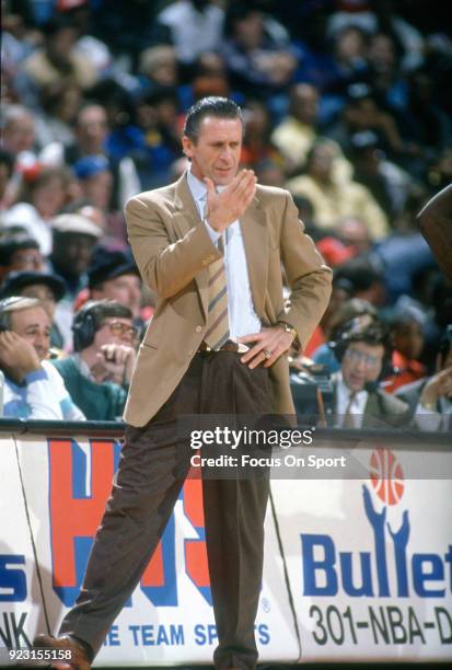 Head Coach Pat Riley of the New York Knicks looks on against the Washington Bullets during an NBA basketball game circa 1992 at the Capital Centre in...