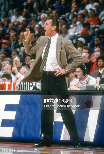 Head Coach Pat Riley of the New York Knicks looks on against the Washington Bullets during an NBA basketball game circa 1993 at the Capital Centre in...