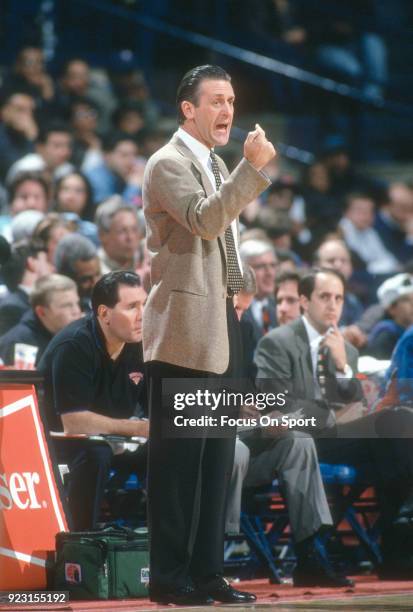 Head Coach Pat Riley of the New York Knicks looks on against the Washington Bullets during an NBA basketball game circa 1993 at the Capital Centre in...