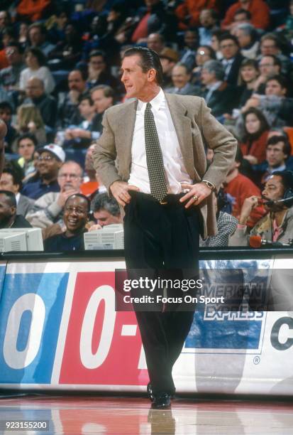 Head Coach Pat Riley of the New York Knicks looks on against the Washington Bullets during an NBA basketball game circa 1993 at the Capital Centre in...