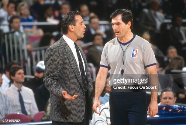 Head Coach Pat Riley of the New York Knicks talks with a referee during an NBA basketball game circa 1993 at Madison Square Garden in the Manhattan...