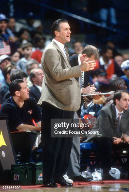 Head Coach Pat Riley of the New York Knicks looks on against the Washington Bullets during an NBA basketball game circa 1993 at the Capital Centre in...