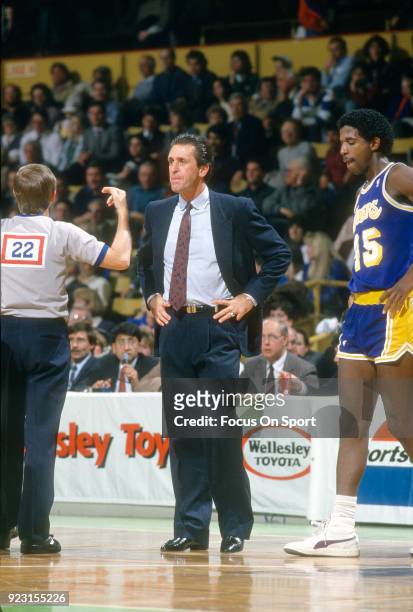 Head Coach Pat Riley of the Los Angeles Lakers looks on against the Boston Celtics during an NBA basketball game circa 1984 at the Boston Garden in...