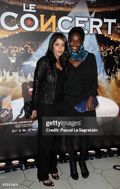 Actresses Leïla Bekhti and Aissa Maiga attend the Premiere of the Radu Mihaileanu's film "Le Concert" at Theatre du Chatelet on October 23, 2009 in...