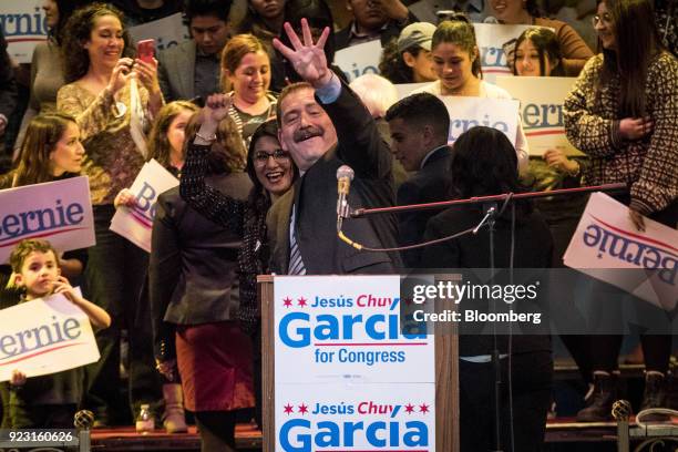 Jesus Garcia, Democratic U.S. House candidate from Chicago, waves to the crowd during a campaign rally in Chicago, Illinois, U.S., on Thursday, Feb....