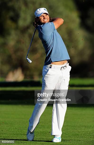Johan Edfors of Sweden plays his approach shot on the 17th hole during the continuation of the delayed second round of the Castello Masters Costa...