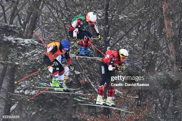 Kelsey Serwa of Canada competes with Brittany Phelan of Canada and Fanny Smith of Switzerland during the Freestyle Skiing Ladies' Ski Cross Big Final...