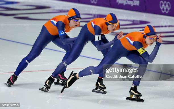 Marrit Leenstra, Ireen Wust and Antoinette de Jong of the Netherlands compete against Japan during the Speed Skating Women's Team Pursuit Final A on...