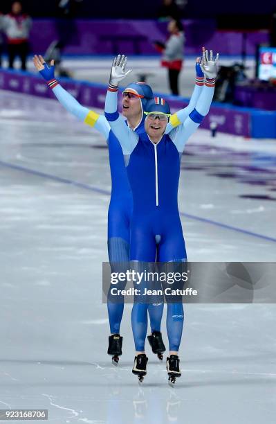 Sverre Lunde Pedersen and Simen Spieler Nilsen of Norway celebrate their victory against Korea following the Speed Skating Men's Team Pursuit Final A...