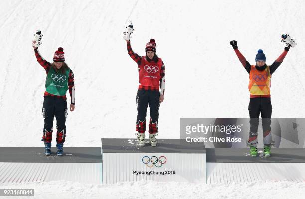 Kelsey Serwa of Canada celebrates winning the gold medal with silver medallist Brittany Phelan of Canada and bronze medallist Fanny Smith of...