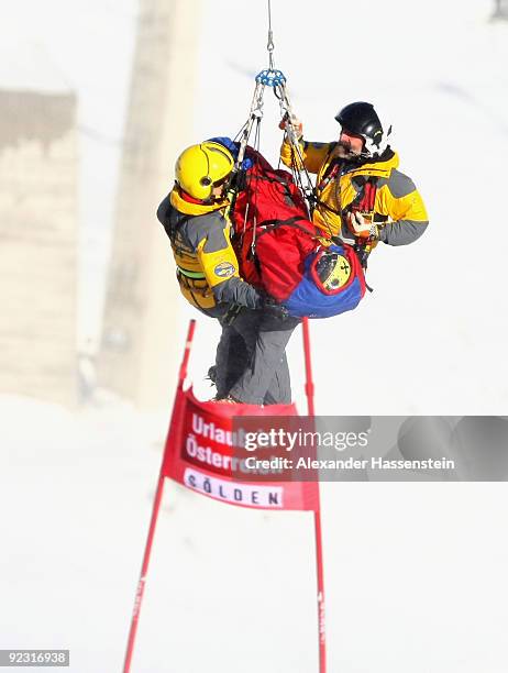 Nicole Hosp of Austria is carried away on a rescue helicopter after getting injured in the Women's giant slalom event of the Woman's Alpine Skiing...