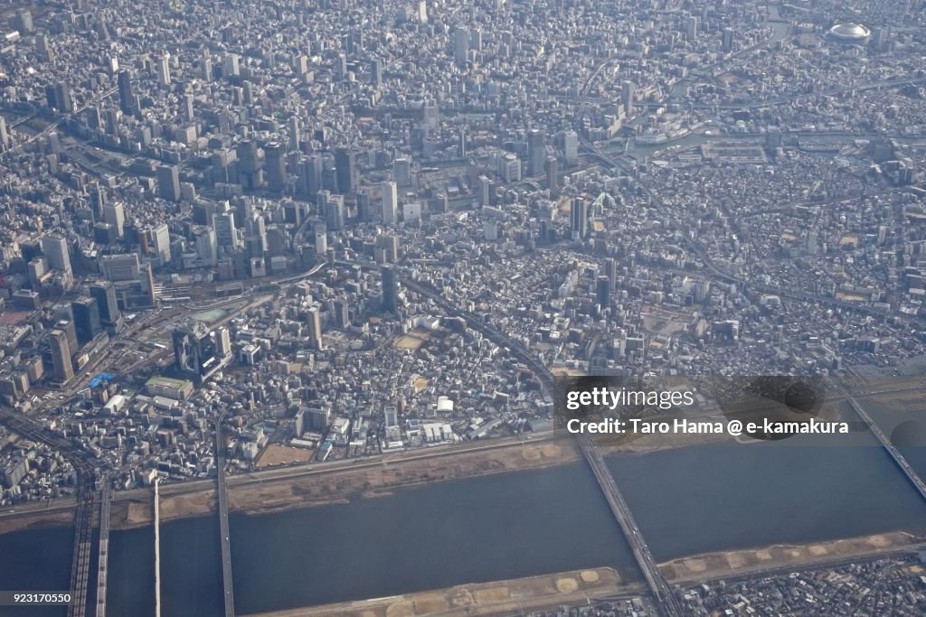 Umeda area and Yodo River in Osaka city in Osaka prefecture in Japan daytime aerial view from airplane