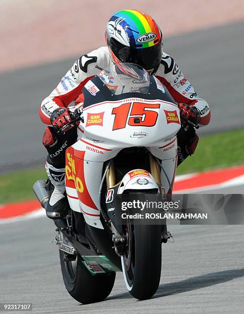 Alex de Angelis of San Marino takes part in a free practice session ahead of the the Malaysian Motocycle Grand Prix in Sepang on October 23, 2009....