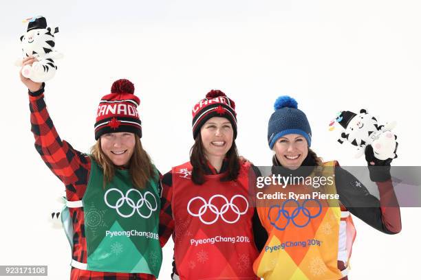 Kelsey Serwa of Canada celebrates winning the gold medal with silver medallist Brittany Phelan of Canada and bronze medallist Fanny Smith of...