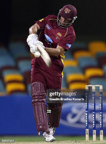 Lee Carseldine of the Bulls hits the ball for a four during the Ford Ranger Cup match between the Queensland Bulls and the Western Australian...