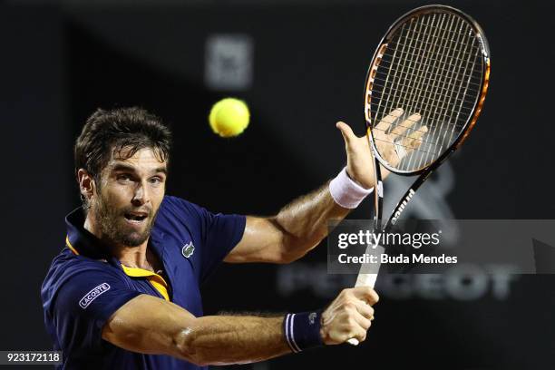 Pablo Andujar of Spain returns a shot to Dominic Thiem of Austria during the ATP Rio Open 2018 at Jockey Club Brasileiro on February 22, 2018 in Rio...