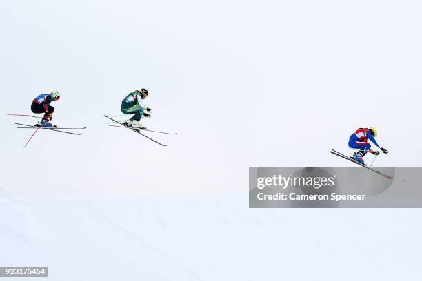 Alizee Baron of France leads from Sami Kennedy-Sim of Australia and Sanna Luedi of Switzerland during the Freestyle Skiing Ladies' Ski Cross Small...