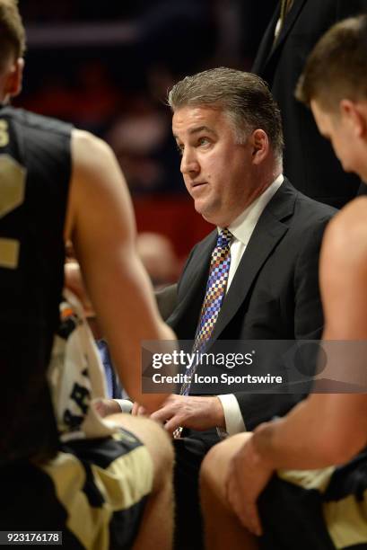 Purdue Boilermakers head coach Matt Painter talks with players in the team huddle during a timeout in the Big Ten Conference college basketball game...