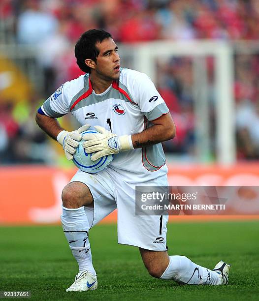 Chile's goalkeeper Claudio Bravo catchs the ball during a FIFA World Cup South Africa-2010 qualifier football match at the Monumental Stadium in...
