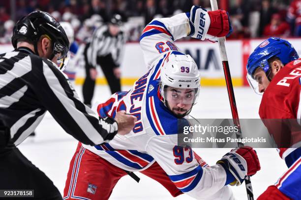 Mika Zibanejad of the New York Rangers watches the puck as he prepares to take a face-off in the third period against the Montreal Canadiens during...