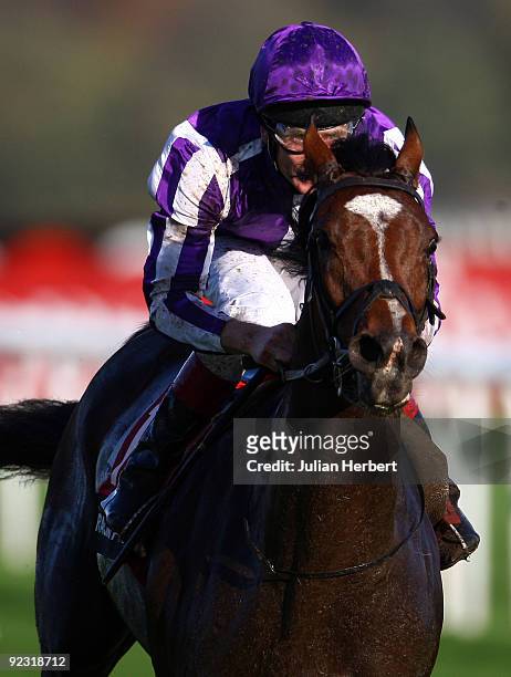 Johnny Murtagh and St Nicholas Abbey lead the field home to land The Racing Post Trophy Race run at Doncaster Racecourse on October 24, 2009 in...