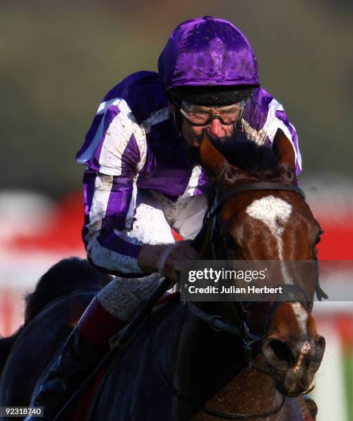 Johnny Murtagh and St Nicholas Abbey lead the field home to land The Racing Post Trophy Race run at Doncaster Racecourse on October 24, 2009 in...
