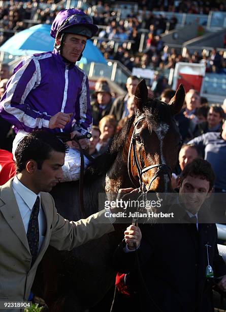 Johnny Murtagh and St Nicholas Abbey return after landing The Racing Post Trophy Race run at Doncaster Racecourse on October 24, 2009 in Doncaster,...