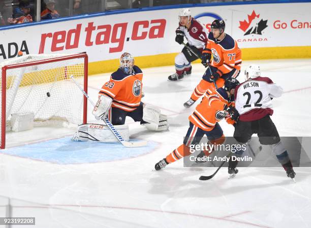 Cam Talbot of the Edmonton Oilers sees the puck go past him during the game against the Colorado Avalanche on February 22, 2018 at Rogers Place in...