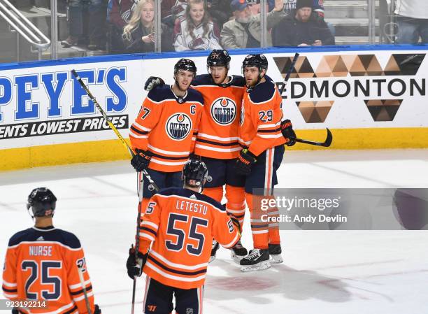 Connor McDavid, Oscar Klefbom and Leon Draisaitl of the Edmonton Oilers celebrate after scoring the game winning goal against the Colorado Avalanche...