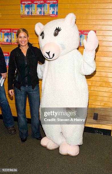 Chef Cat Cora poses with Loukoumi at "Loukoumi's Gift" narrated by Jennifer Aniston at Barnes & Noble, Lincoln Center on October 24, 2009 in New York...