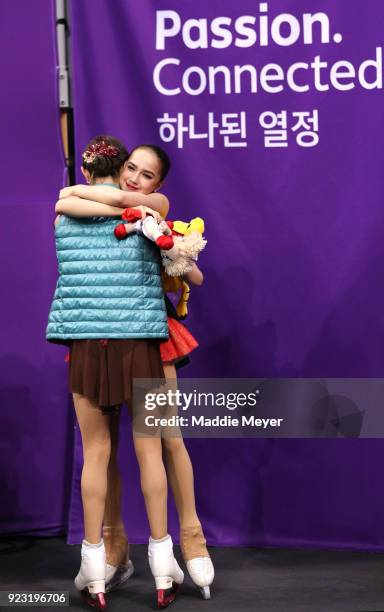 Gold medal winner Alina Zagitova of Olympic Athlete from Russia hugs silver medal winner Evgenia Medvedeva of Olympic Athlete from Russia during the...