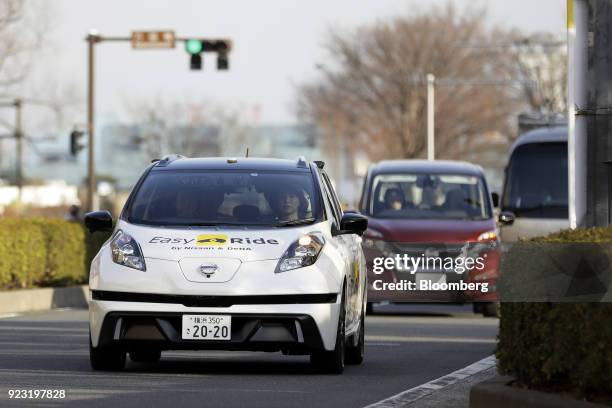 Nissan Motor Co. Leaf electric vehicle used for the "Easy Ride" robot taxi service, jointly developed by Nissan and DeNA Co., operates during a test...