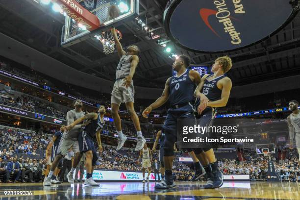 Georgetown Hoyas guard Kaleb Johnson in action against Xavier Musketeers forward Tyrique Jones and guard J.P. Macura on February 21 at the Capital...