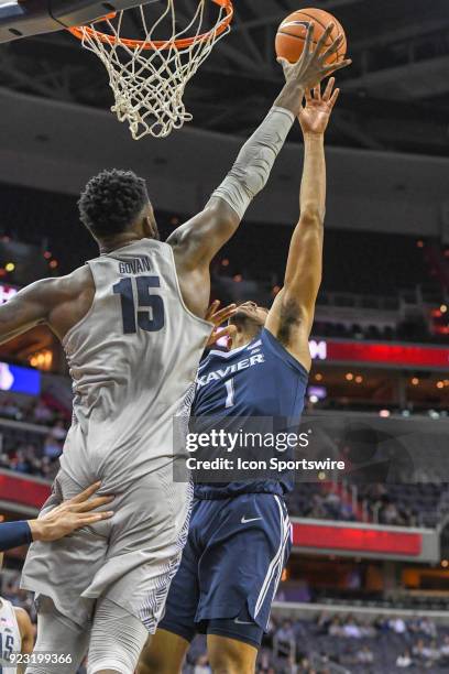 Xavier Musketeers guard Paul Scruggs in action against Georgetown Hoyas center Jessie Govan on February 21 at the Capital One Arena in Washington,...