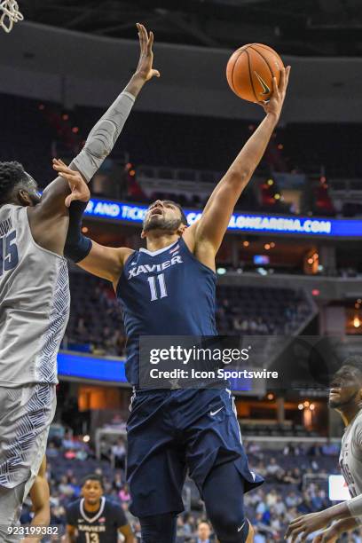 Xavier Musketeers forward Kerem Kanter in action against Georgetown Hoyas center Jessie Govan on February 21 at the Capital One Arena in Washington,...