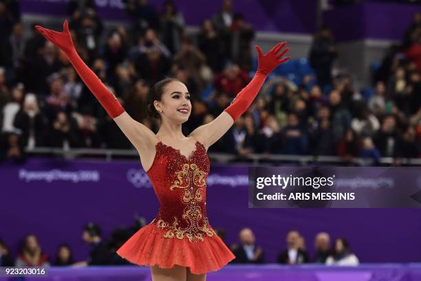 Russia's Alina Zagitova reacts after before the venue ceremony after the women's single skating free skating of the figure skating event during the...