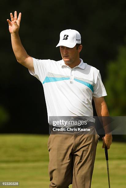 Matt Every waves to the crowd after making a birdie putt on the second hole during the third round of the Nationwide Tour Championship at Daniel...