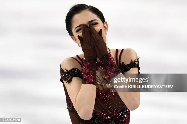 Russia's Evgenia Medvedeva reacts after competing in the women's single skating free skating of the figure skating event during the Pyeongchang 2018...